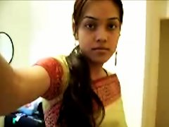A Teenage Indian Woman Strips And Performs In A Live Webcam Show, Displaying Her Natural Beauty For All To See.